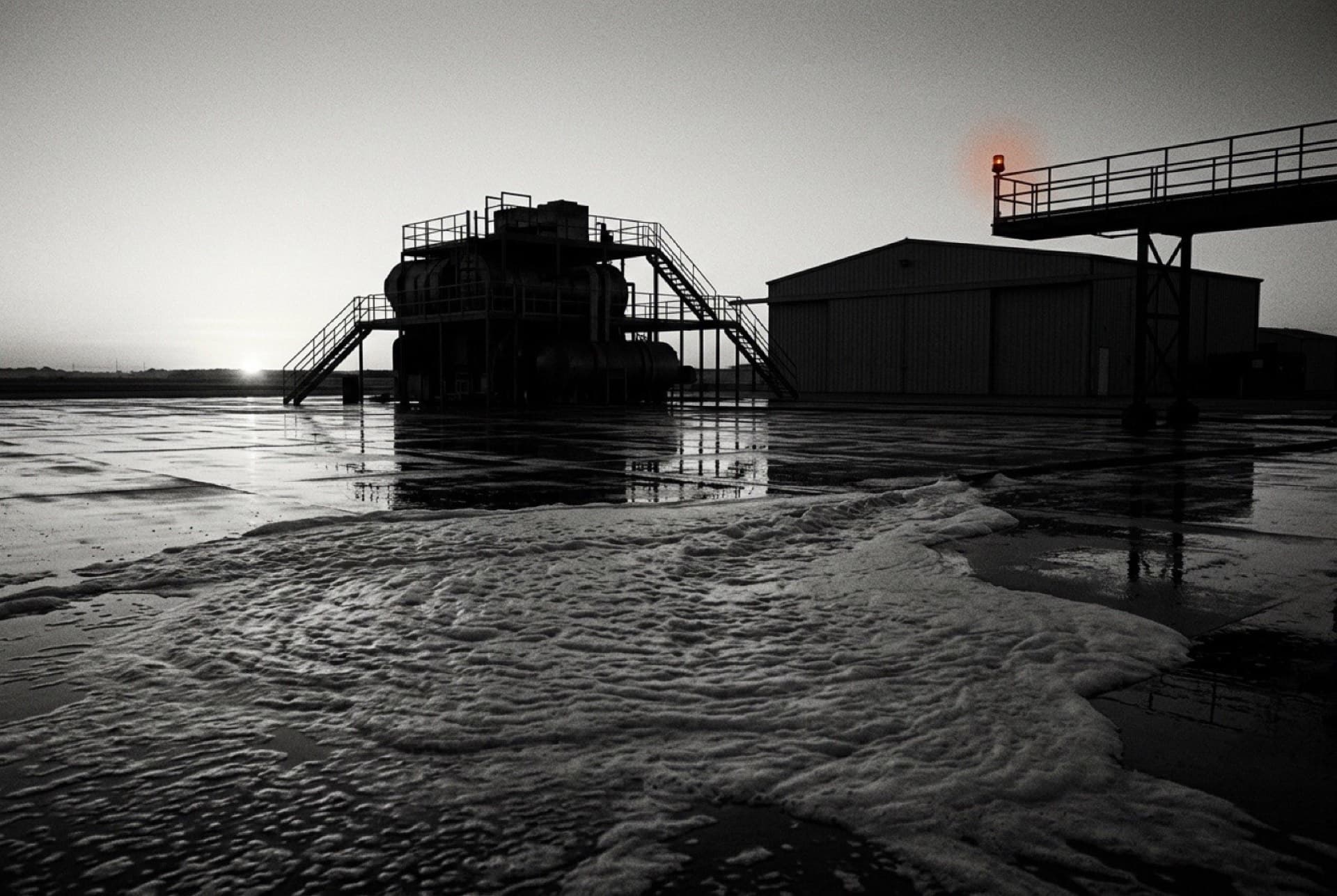Firefighting foam spread across an industrial training ground (photo illustration)