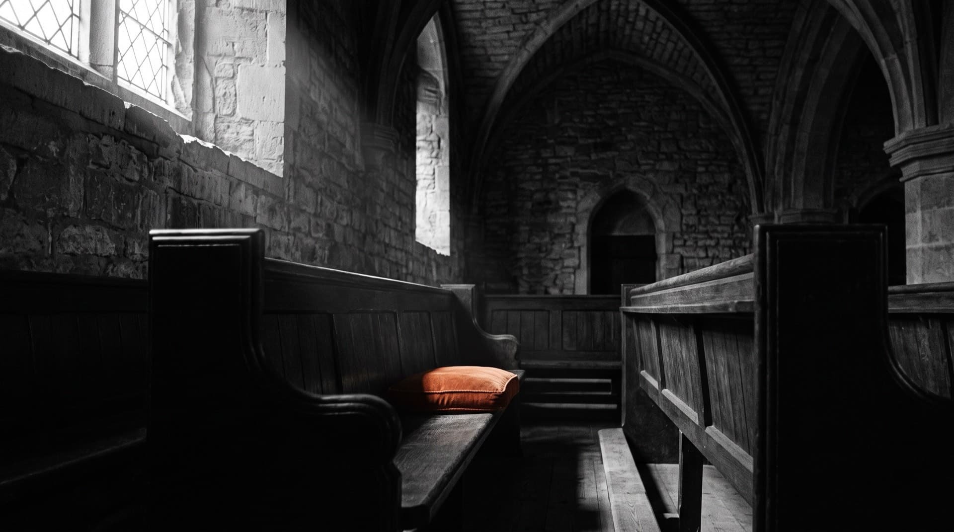Empty pews in a dim church nave (photo illustration)