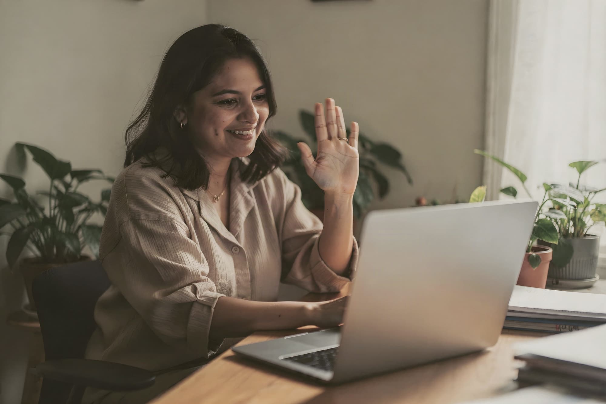 woman on a friendly video call at her laptop